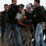 Ayuda-palestinos-companero-Cisjordania-AFP_CLAIMA20141212_0267_27