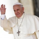 Pope Francis waves as he leads his weekly audience in Saint Peter’s Square at the Vatican