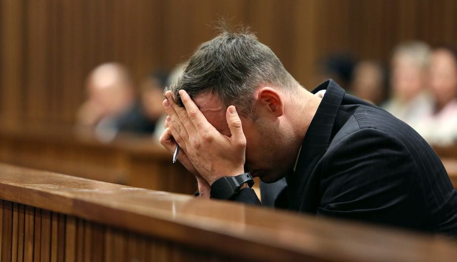 Oscar Pistorius reacts during the third day of his resentencing hearing for the 2013 murder of his girlfriend Reeva Steenkamp, in the North Gauteng High Court in Pretoria, South Africa June 15, 2016. REUTERS/Alon Skuy/Pool