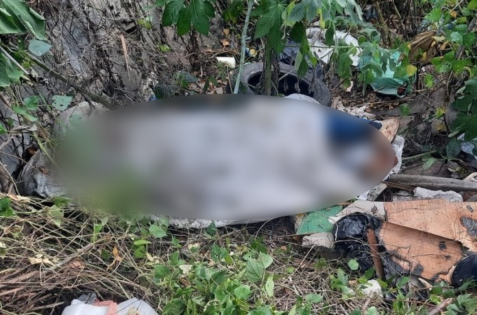 muerto tapado con sábana en Tegucigalpa