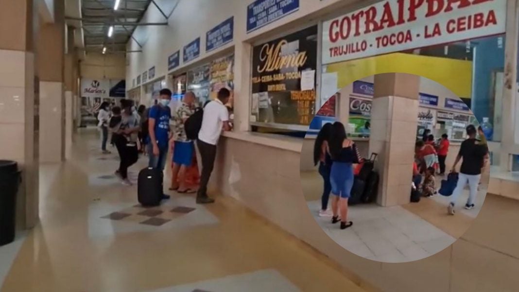 viajeros en Terminal de Buses en SPS