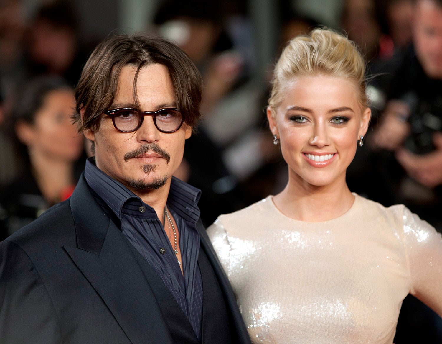 Amber Heard fotos Johnny Depp desmayado 