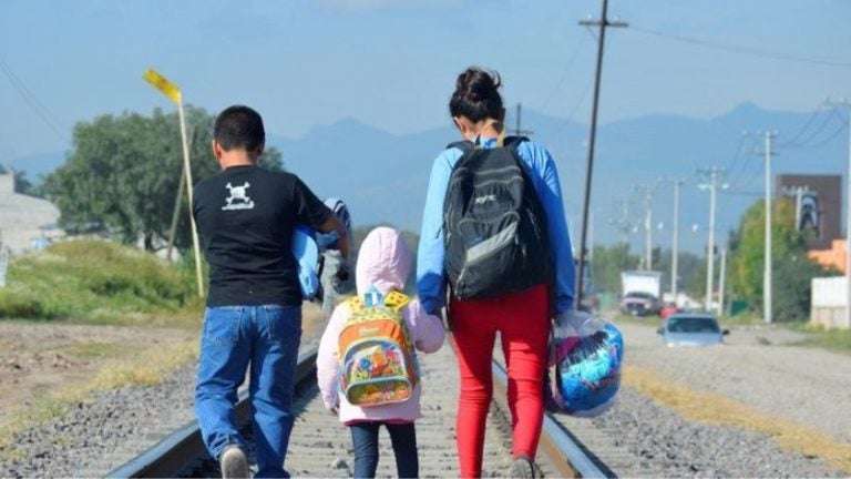 Hondureña migrantes y sus hijos