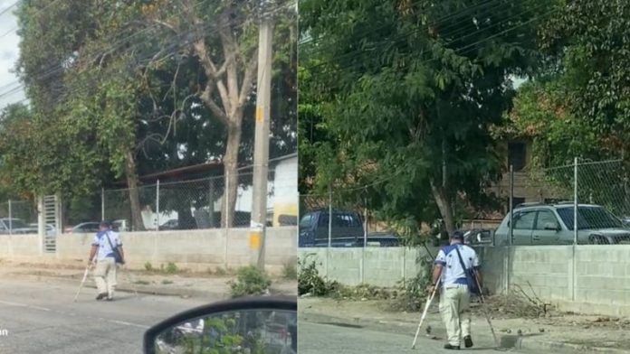 hondureño con muletas caminando