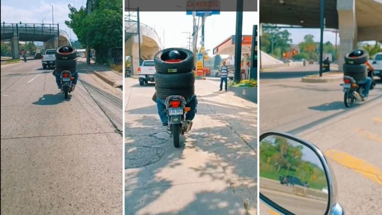 motociclista conduce cubierto de llantas