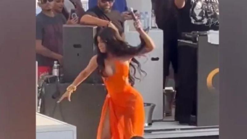 Cardi B throws microphone at fan who threw drink at her at concert