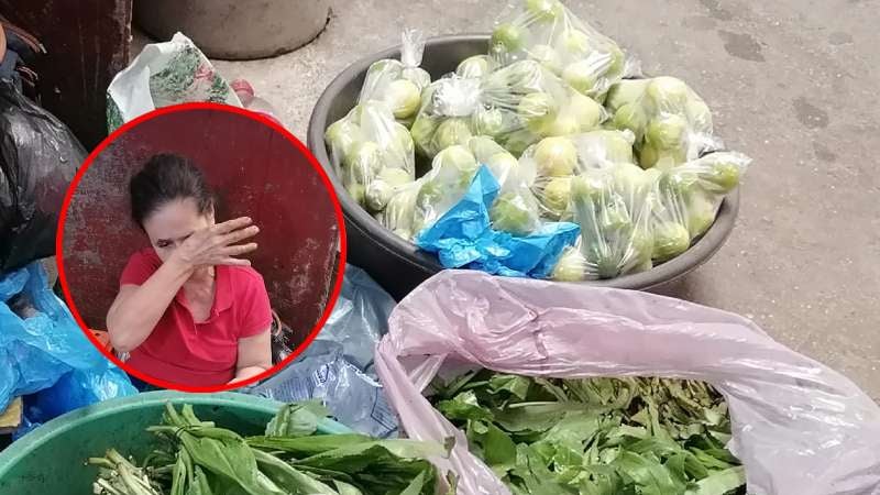 Mujer vende limones en Choloma