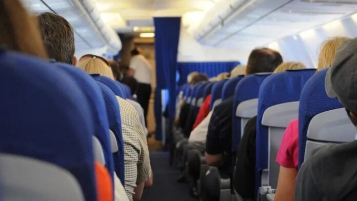 obesa mujer no cede asiento avión niño