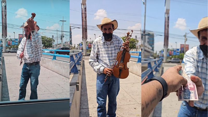Anciano toca el violín en Tegucigalpa