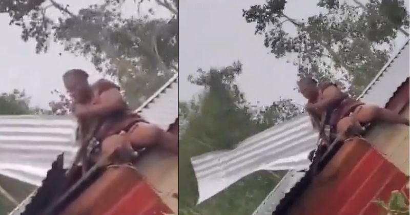 ¡Desesperación! Mujer se aferra a su techo durante huracán en Jamaica
