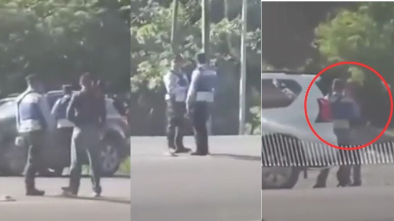 Captan a policías recibiendo 