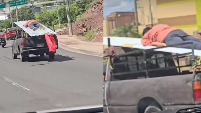 Captan a hombre encima de láminas transportadas en un carro en marcha en TGU