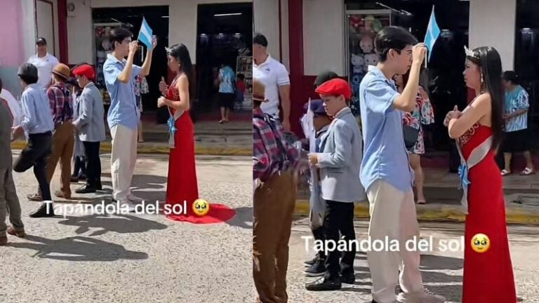 Joven protege a su hermana del sol durante desfiles patrios