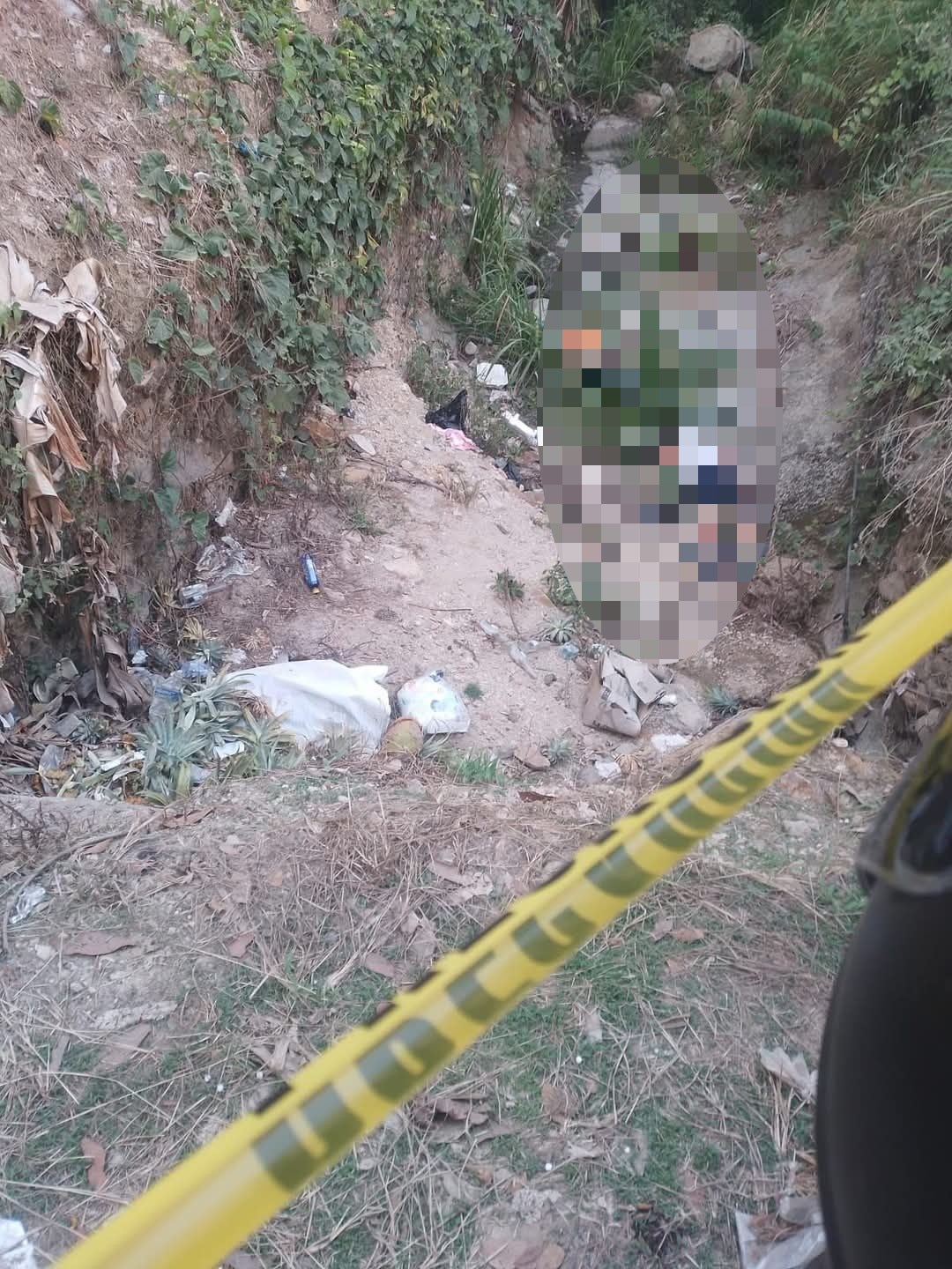Escena del crimen donde quedaron los cuerpos de los jóvenes.