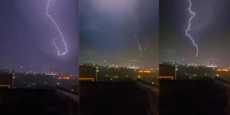 relámpagos iluminan el cielo de Tegucigalpa durante fuerte aguacero
