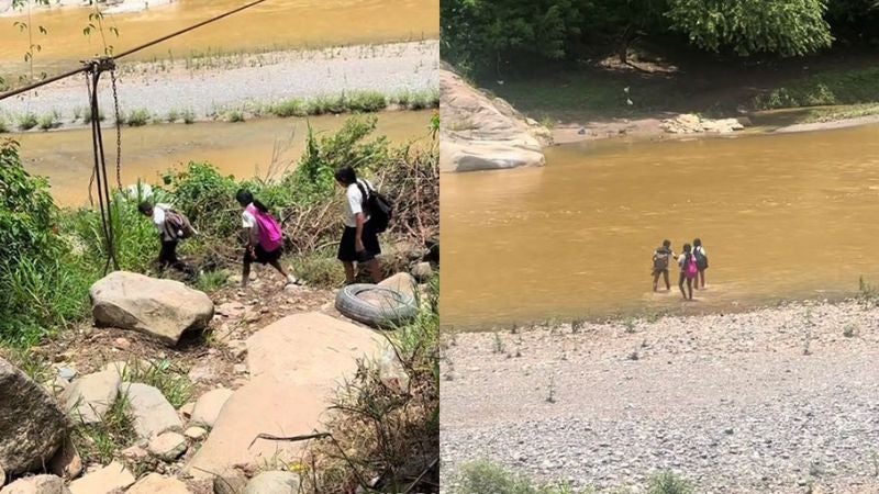 escolares cruzan río Cangrejal